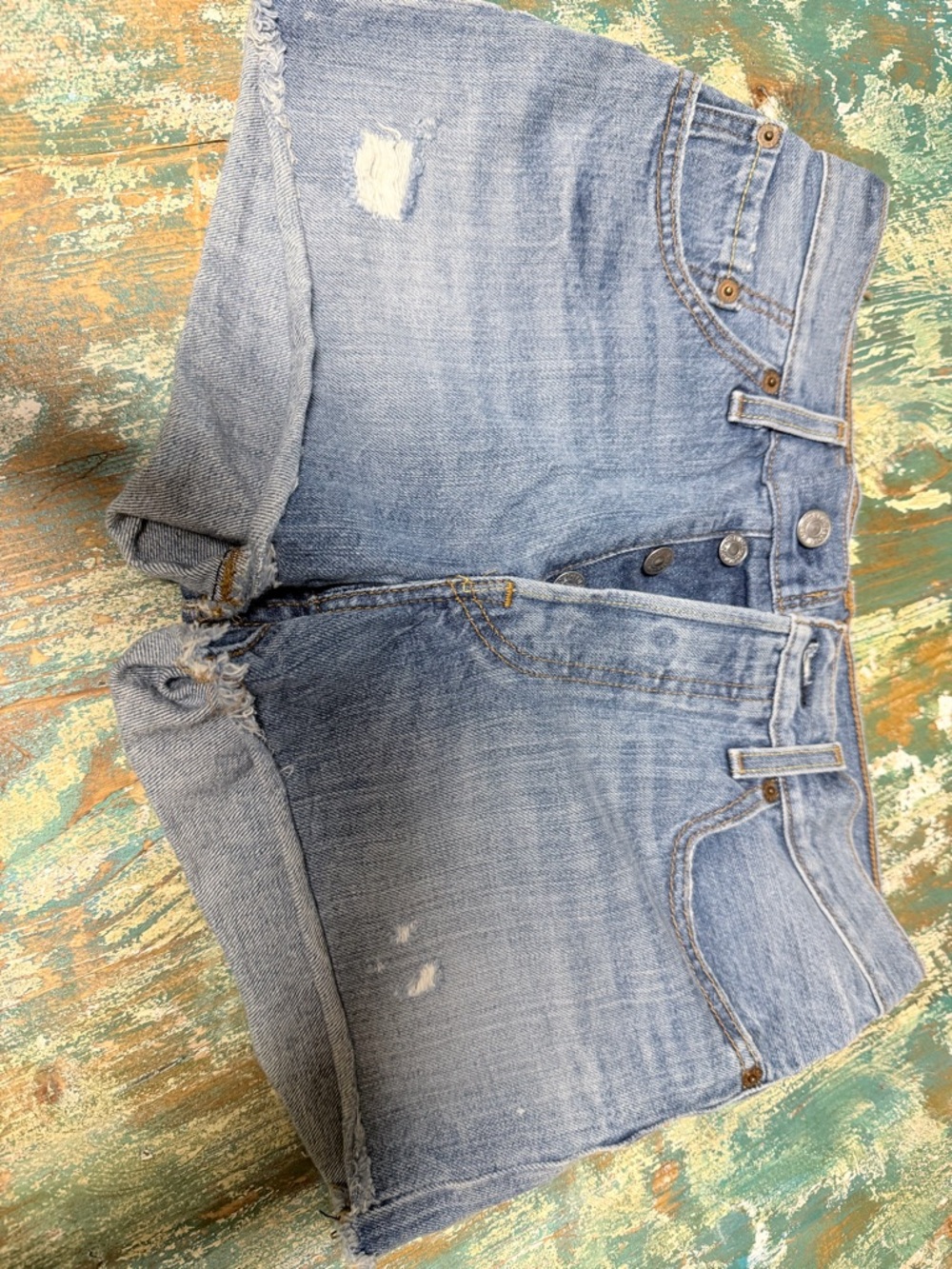 501 Levi's Light Blue Distressed Denim Shorts